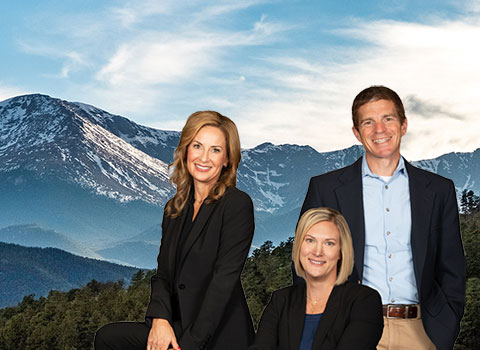 Image of Pikes peak with the KHM partners in the foreground KHM Attorneys at Law Colorado Springs, Castle Rock