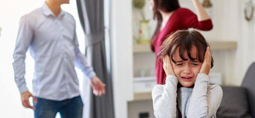 parents argue as young girl cries and covers her ears KHM Attorneys at Law Colorado Springs, Castle Rock