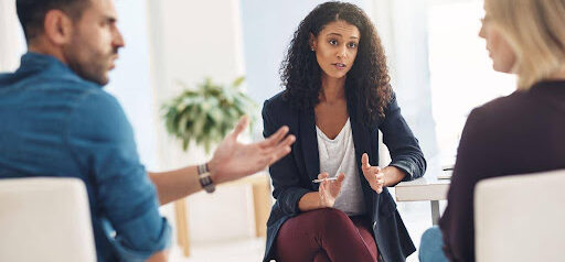 man and woman participate in mediation to help with communication KHM Attorneys at Law Colorado Springs, Castle Rock