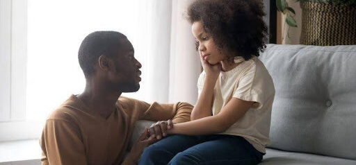 father consoles child while discussing divorce KHM Attorneys at Law Colorado Springs, Castle Rock