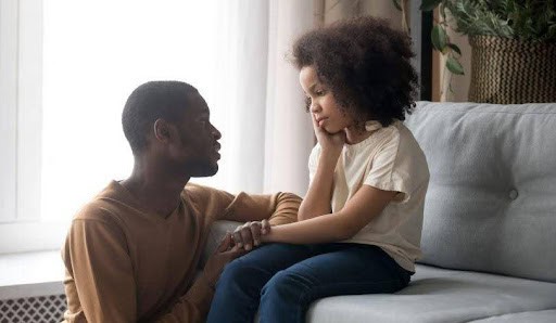 father consoles child while discussing divorce KHM Attorneys at Law Colorado Springs, Castle Rock