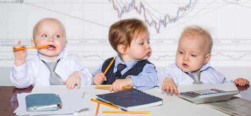 three toddlers pretending to prepare taxes KHM Attorneys at Law Colorado Springs, Castle Rock