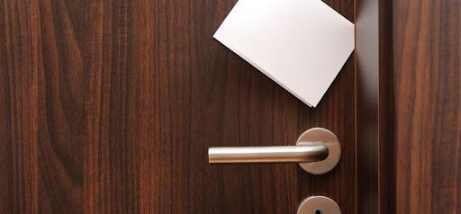 white note in door jam KHM Attorneys at Law Colorado Springs, Castle Rock