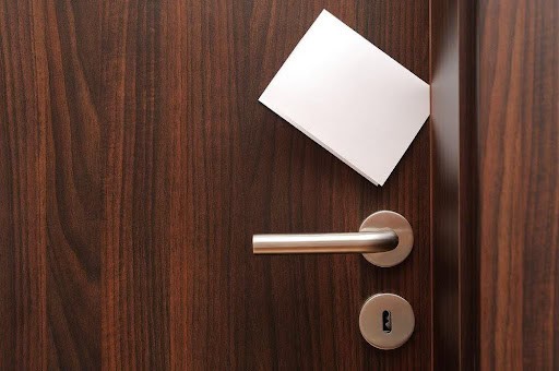 white note in door jam KHM Attorneys at Law Colorado Springs, Castle Rock