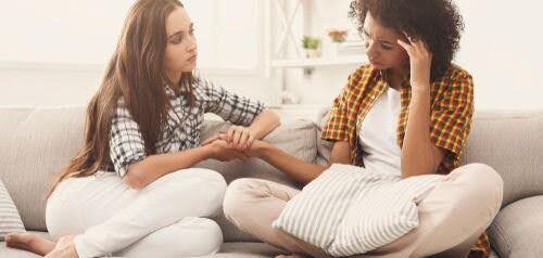 woman confides in friend about getting a divorce KHM Attorneys at Law Colorado Springs, Castle Rock