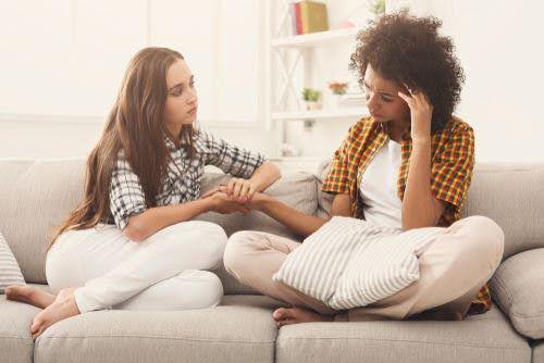 woman confides in friend about getting a divorce KHM Attorneys at Law Colorado Springs, Castle Rock