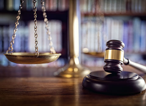 close up of gavel with legal scales in background KHM Attorneys at Law Colorado Springs, Castle Rock
