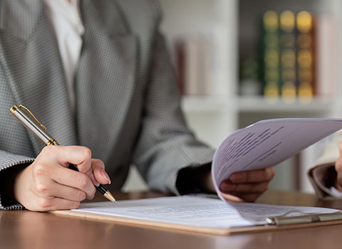 female attorney provides legal services for client KHM Attorneys at Law Colorado Springs, Castle Rock